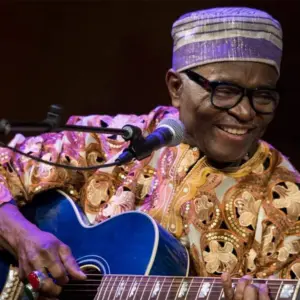 Making Waves: A Congolese Guitarist Tests His Range