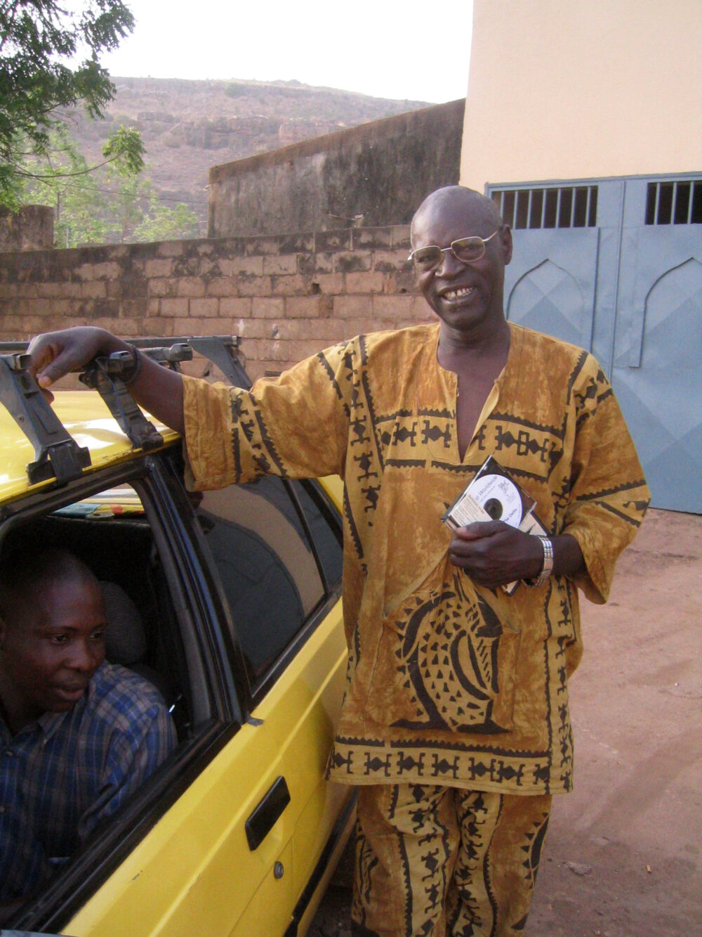 Ali outside his Bamako house (Eyre, 2005)
