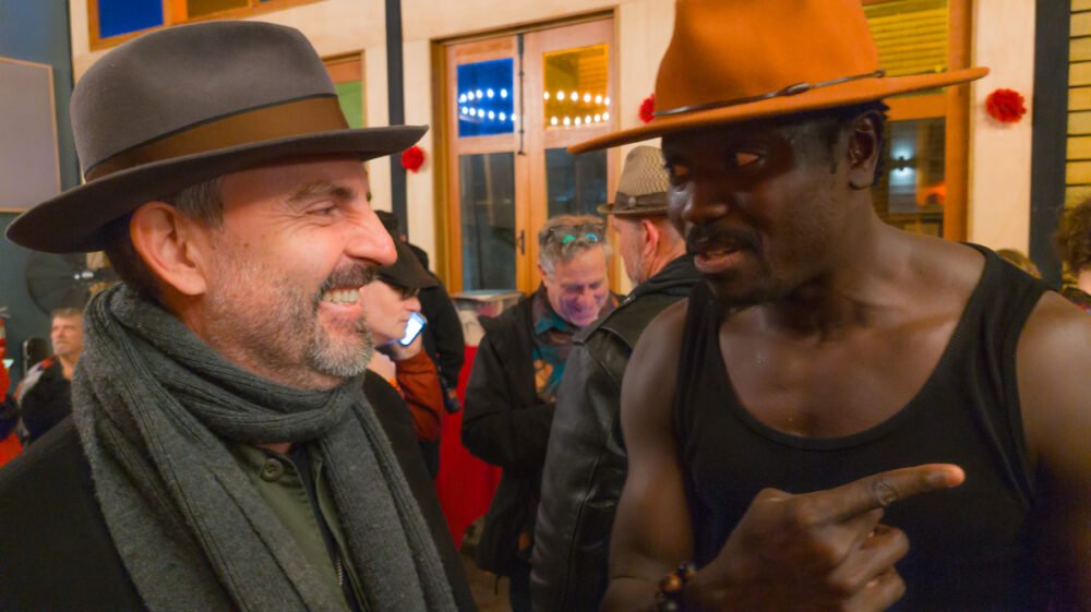 Cheikh with ace New Orleans guitarist Raja Kasis