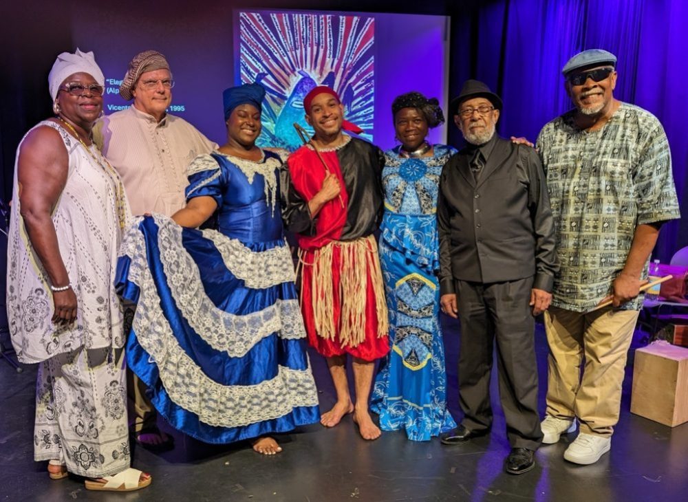 Ivor Miller (second from left) and performers at 2024 Holyoke event