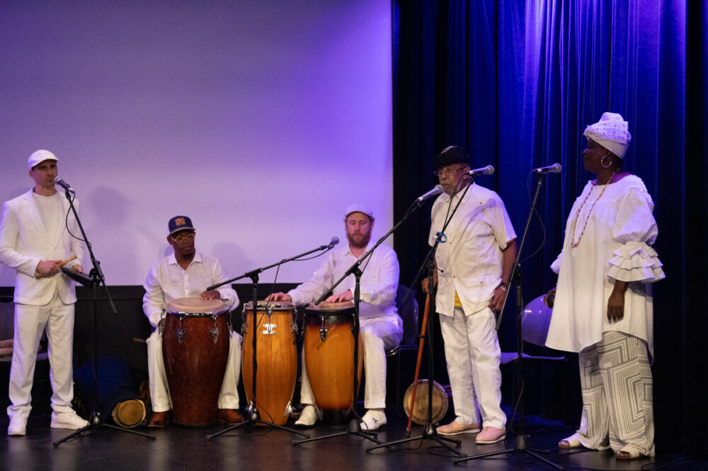 The musicians, Sandy Perez with round glasses and baseball hat, Lazaro Galarraga second from right